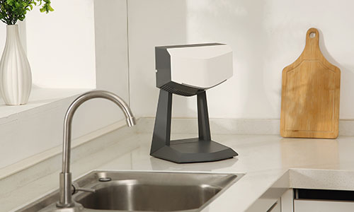 white electric hand dryer on stand