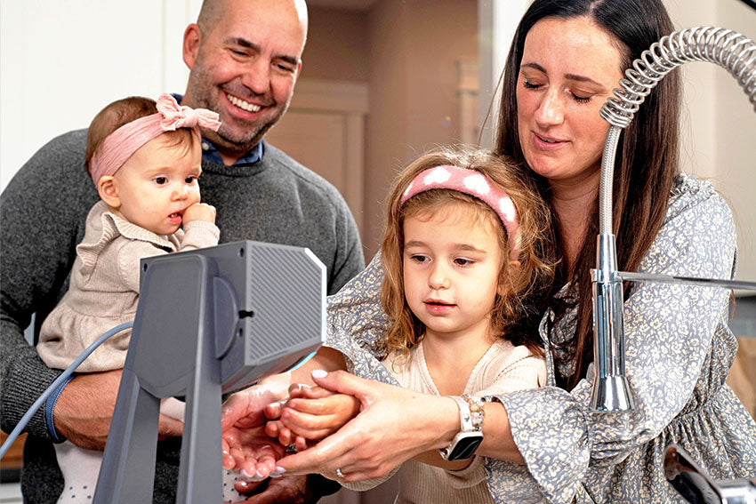 family using the rev squared dryer in their homes kitchen